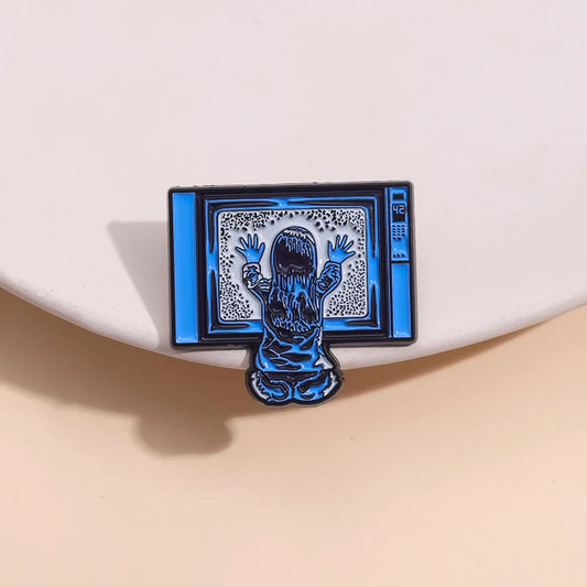 Poltergeist Enamel Pin